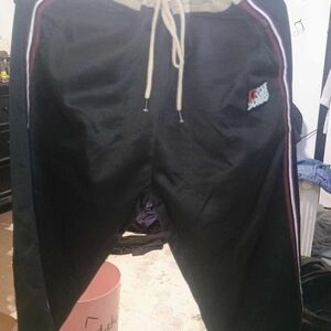 Nike Black Joggers with Red Stripe